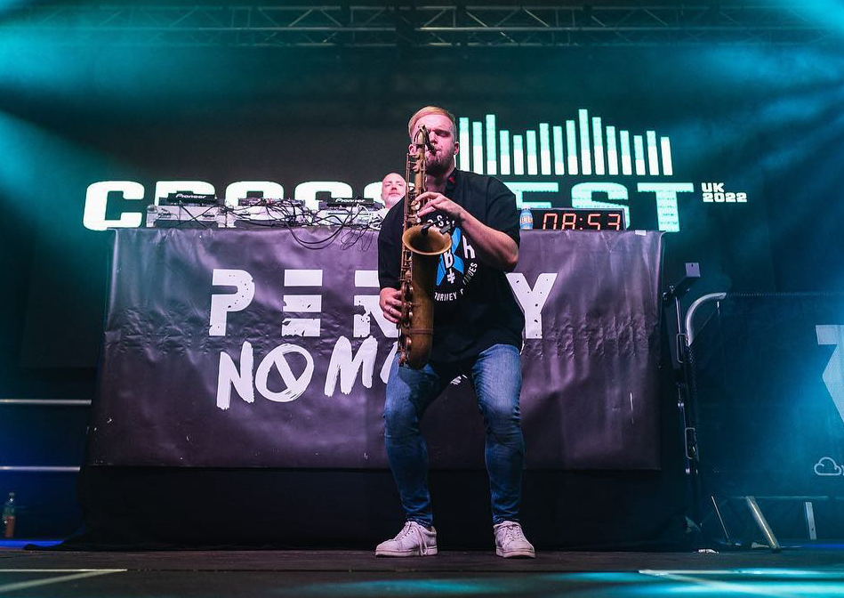 Joe Reeve, a professional Saxophonist for hire performing at a corporate festival. 